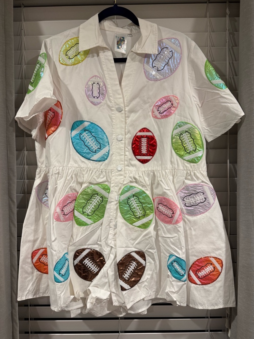 QUEEN OF SPARKLES White Short Sleeve Romper with Multicolor Football Appliqués